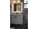Bathroom features a sleek vanity with a modern faucet and LED mirror at 3419 Hamilton Ave, Hapeville, GA 30354