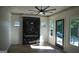 Bright living room featuring a modern fireplace and access to a patio at 3419 Hamilton Ave, Hapeville, GA 30354