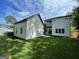 Modern two-story house with detached garage and a large backyard at 3419 Hamilton Ave, Hapeville, GA 30354