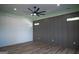 Bright bedroom with wood flooring and accent wall at 3419 Hamilton Ave, Hapeville, GA 30354