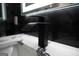 Modern black faucet in a stylish bathroom at 3419 Hamilton Ave, Hapeville, GA 30354