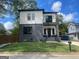 Modern two-story home with gray brick and white siding at 3419 Hamilton Ave, Hapeville, GA 30354