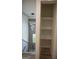 Convenient hallway closet with shelves for extra storage at 3419 Hamilton Ave, Hapeville, GA 30354