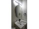 Modern bathroom with a unique floating sink and sleek lighting at 3419 Hamilton Ave, Hapeville, GA 30354