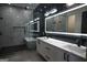 Elegant bathroom with double vanity and large mirror at 3419 Hamilton Ave, Hapeville, GA 30354