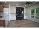 Open living space with a modern marble fireplace and hardwood floors at 3419 Hamilton Ave, Hapeville, GA 30354
