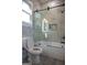 Modern bathroom with a glass shower door, soaking tub, and stylish fixtures at 3419 Hamilton Ave, Hapeville, GA 30354