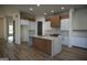Modern kitchen with white cabinets, wood island and quartz countertops at 3419 Hamilton Ave, Hapeville, GA 30354