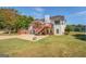 Two-story house with deck and large backyard at 1483 Woodlawn Rd, Covington, GA 30014