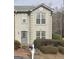 Two story townhome with neutral color exterior at 4403 Pinscher St, Union City, GA 30291
