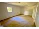 Simple bedroom with carpet and a window at 164 Glenloch Pkwy, Stockbridge, GA 30281