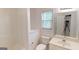 Clean bathroom with shower, toilet, and vanity at 1461 Hada Ln, Lawrenceville, GA 30043