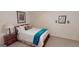 Guest bedroom with double bed, nightstand and carpet at 1461 Hada Ln, Lawrenceville, GA 30043