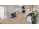 Cozy living room features a stone fireplace and neutral color palette at 1461 Hada Ln, Lawrenceville, GA 30043