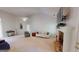 Living room with stone fireplace, neutral decor, and a ceiling fan at 1461 Hada Ln, Lawrenceville, GA 30043
