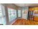 Kitchen breakfast nook with bay window and a chandelier at 1461 Hada Ln, Lawrenceville, GA 30043