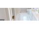 Clean bathroom with double vanity and tile floor at 1461 Hada Ln, Lawrenceville, GA 30043