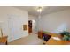 Bright office with desk, built-in shelves, and carpet at 1461 Hada Ln, Lawrenceville, GA 30043