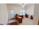 Home office with L-shaped desk and built-in shelves at 1461 Hada Ln, Lawrenceville, GA 30043