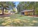 Spacious backyard with detached workshop and shed at 125 Laney Ct, Mcdonough, GA 30252
