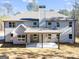 House exterior showcasing back porch and chimney at 980 Temple Draketown Rd, Temple, GA 30179