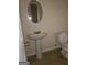 Bathroom with pedestal sink and toilet at 2290 Nicole Dr, Hampton, GA 30228