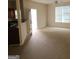 Living room with access to back patio at 2290 Nicole Dr, Hampton, GA 30228