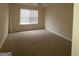 Simple bedroom with carpet and window at 2290 Nicole Dr, Hampton, GA 30228