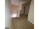Upstairs hallway with carpeted flooring and access to other rooms at 2290 Nicole Dr, Hampton, GA 30228