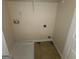 Laundry room with shelving and drain at 2290 Nicole Dr, Hampton, GA 30228