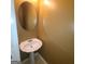 Small powder room with pedestal sink at 2103 Grove Way, Hampton, GA 30228