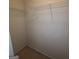 Walk-in closet with wire shelving at 2103 Grove Way, Hampton, GA 30228