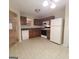 Eat-in kitchen with ample cabinet space at 2103 Grove Way, Hampton, GA 30228