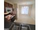 Kitchen with ample counter space and a breakfast nook at 2103 Grove Way, Hampton, GA 30228