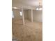 Spacious living room with neutral carpeting at 2103 Grove Way, Hampton, GA 30228