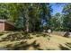 Large backyard with mature trees and level yard at 4850 Lehigh Dr, Douglasville, GA 30135
