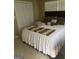Cozy bedroom with a queen-size bed and soft carpeting at 4850 Lehigh Dr, Douglasville, GA 30135