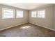 Bright and airy bedroom with neutral walls and carpet flooring at 4850 Lehigh Dr, Douglasville, GA 30135