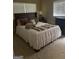 Bright bedroom with comfortable bed and neutral decor at 4850 Lehigh Dr, Douglasville, GA 30135