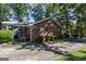 Brick house exterior with screened porch and landscaping at 4850 Lehigh Dr, Douglasville, GA 30135
