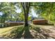 View of house and detached garage from backyard at 4850 Lehigh Dr, Douglasville, GA 30135