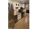 Updated kitchen, stainless steel appliances, white cabinets, granite counters at 4850 Lehigh Dr, Douglasville, GA 30135