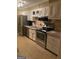 Well-equipped kitchen with stainless steel appliances and ample counter space at 4850 Lehigh Dr, Douglasville, GA 30135