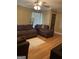 Bright living room with hardwood floors and a comfortable seating area at 4850 Lehigh Dr, Douglasville, GA 30135