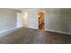 Open living room with access to kitchen and hallway at 4850 Lehigh Dr, Douglasville, GA 30135