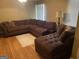 Relaxing living room, hardwood floors, large sectional sofa at 4850 Lehigh Dr, Douglasville, GA 30135