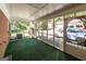 Inviting screened porch overlooking the backyard and driveway at 4850 Lehigh Dr, Douglasville, GA 30135