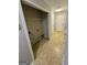 Convenient laundry room with shelving and space for washer/dryer at 345 Alcovy Cir, Covington, GA 30014