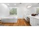 Large bathroom with double vanity and a jetted tub at 270 Emerald Lake Dr, Fayetteville, GA 30215