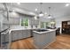 Spacious kitchen with gray cabinets, stainless steel appliances, and an island at 270 Emerald Lake Dr, Fayetteville, GA 30215